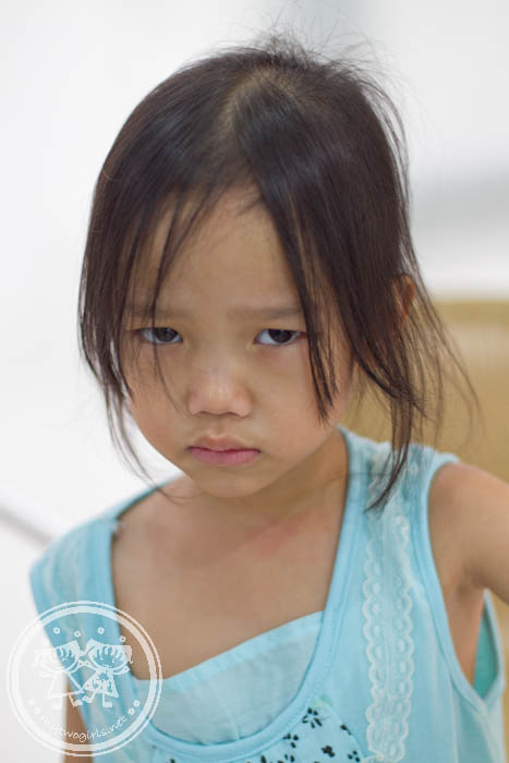 This girl is always sulking and refuse to corporate with the camera